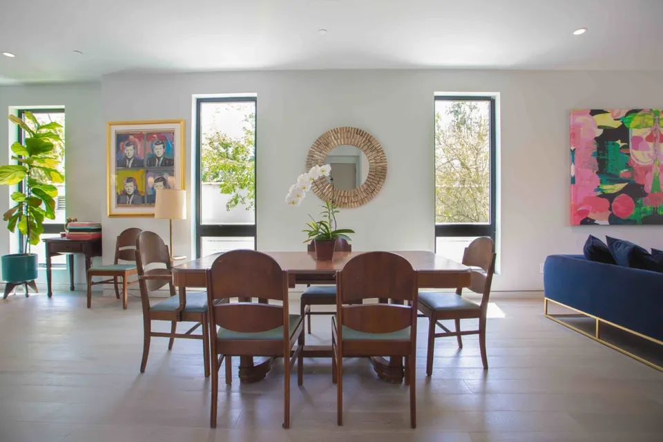 Dining area beside a bright garden window