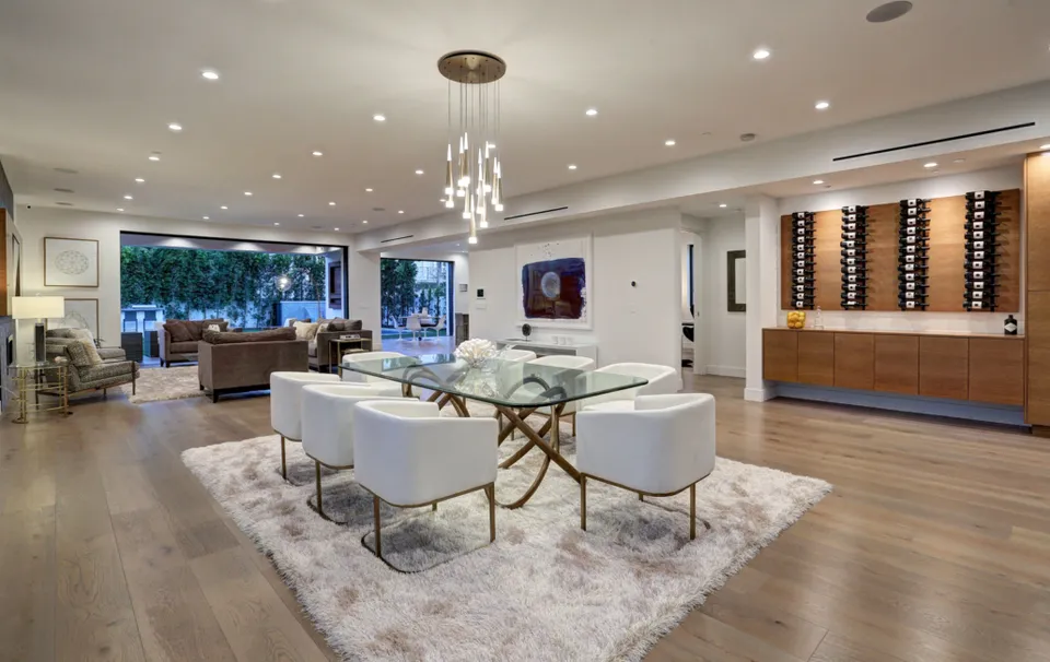Open living room with seating and fitted cabinetry
