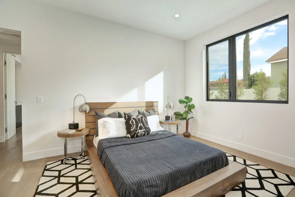 Bedroom with neutral finishes and natural light